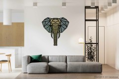 ein Wohnzimmer mit einer Couch und einem an der Wand befestigten Elefantenkopf, moosbild, mooswand, moos pflanzen, moos, moos deko, moos art